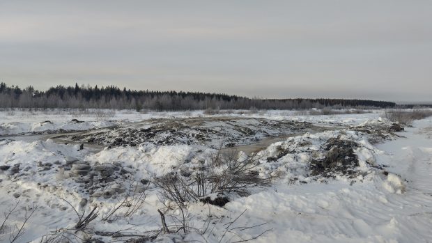 Talvinen kuva muokatusta maasta.